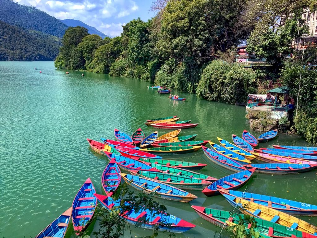Nepal-Pokhara-Wooden-boats-on-Phewa-Lake